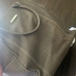 Large bag, it’s got a little black stain on one of the sides but that’s it!